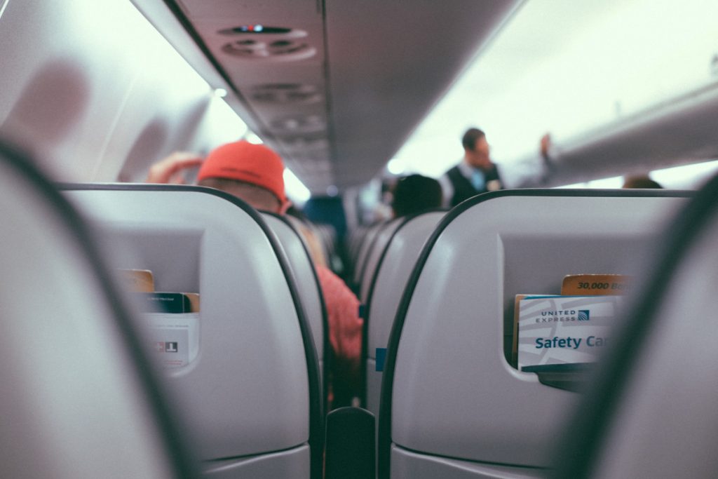 How To Fly Comfortably Even If You Get The Middle Seat